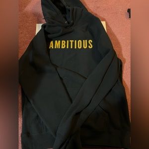 BRAND NEW/NEVER WORN Phenomenal Woman “Ambitious” hoodie. Women’s size Large.